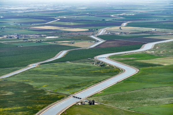 An aerial view looking south shows the California Aqueduct (right) and the Delta-Mendota Canal (Left) south of San Luis Reservoir near Los Banos in Merced County, California.